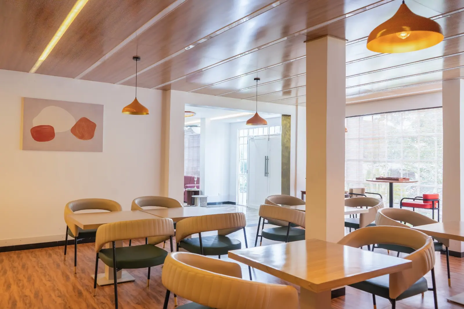 Contemporary indoor dining room at Leora by White Land