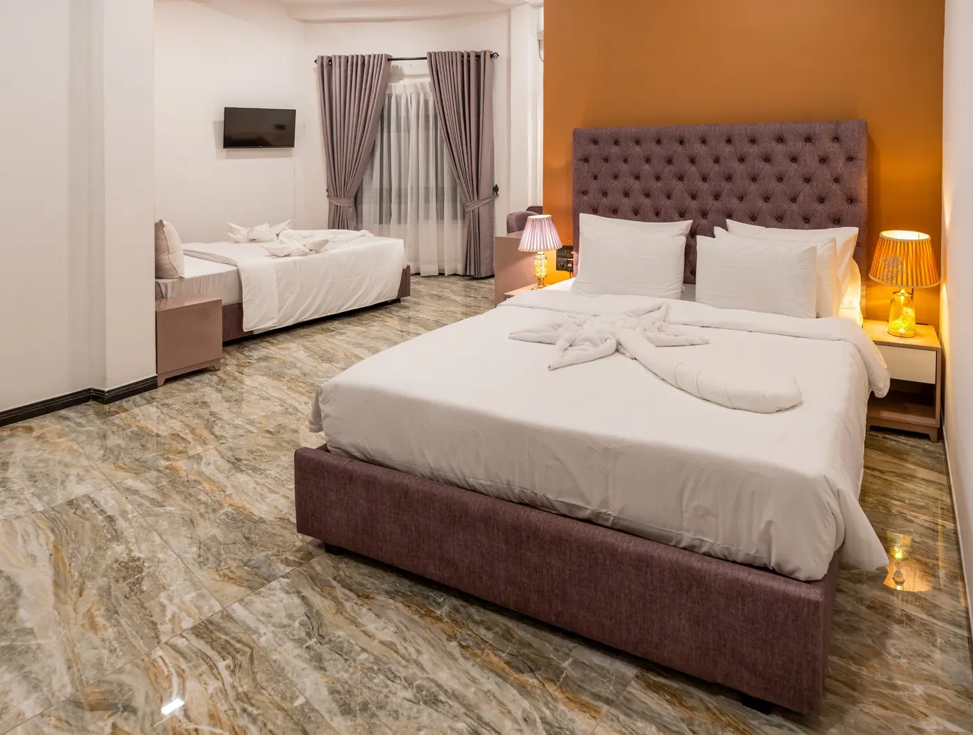 Family Room with two beds at White Land City Hotel